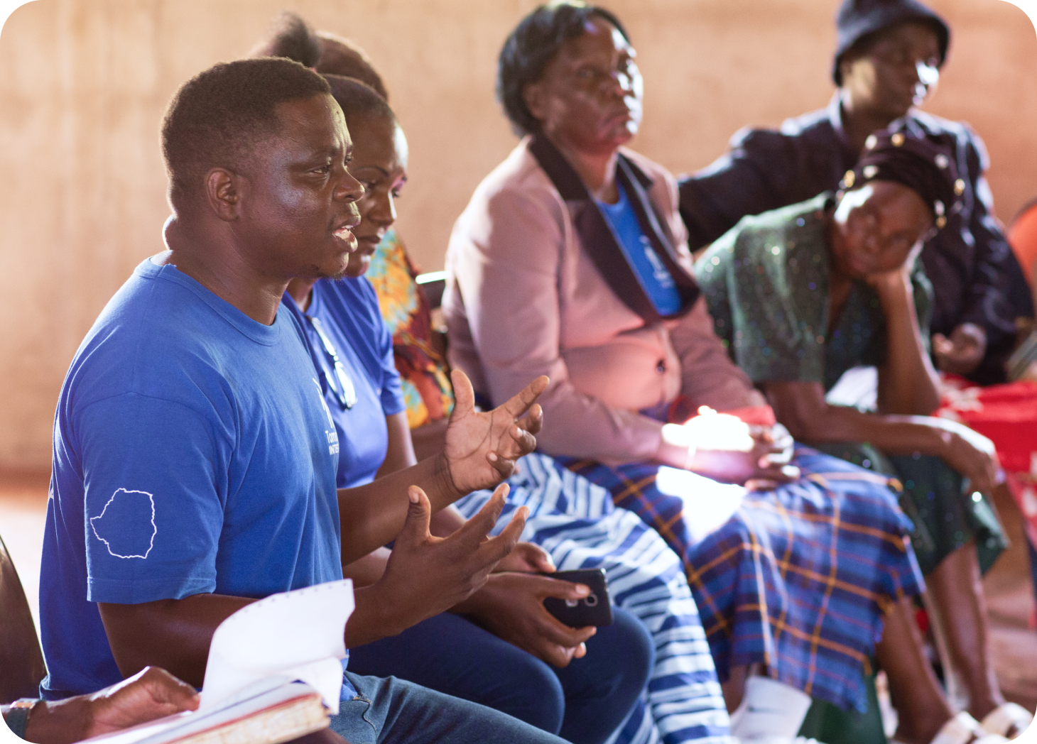 Emmanuel introducing the Farming Skill-Building Program to Tomorrow Clubs leaders.